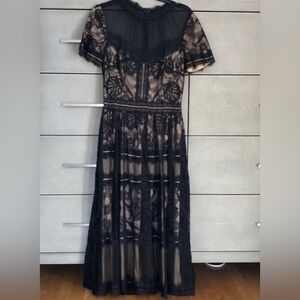 Looking for a Tadashi Shoji CAMILLA TEA-LENGTH DRESS in black or navy size 12 14